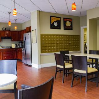 A modern kitchen and dining area with stylish furniture and decor.