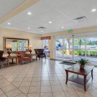 A spacious lobby with comfortable seating and modern decor.