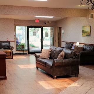 A cozy and inviting lobby area with comfortable seating and ample natural light.
