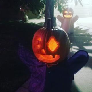 A whimsical jack-o'-lantern glowing against a spooky backdrop, perfect for Halloween festivities.