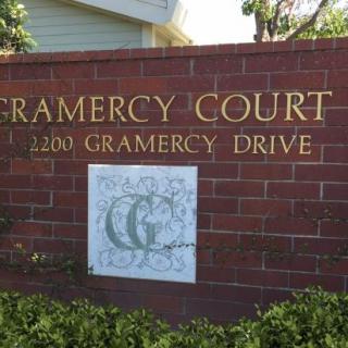 Sign for Gramercy Court with address 2200 Gramercy Drive.