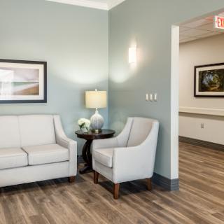 A serene waiting area featuring comfortable seating and contemporary decor.
