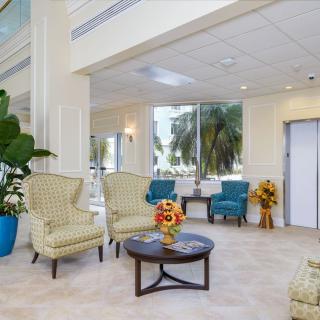 A modern lobby with elegant seating and large windows.