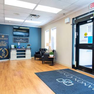 A modern office lobby featuring comfortable seating and a welcoming atmosphere.