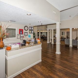 A welcoming reception area with hardwood floors and stylish decor.