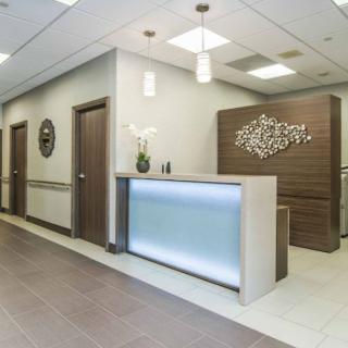 A modern and minimalist reception area with sleek decor and a welcoming atmosphere.