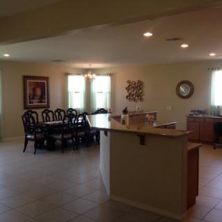 Modern open floor plan with a kitchen and dining area.