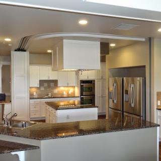 A modern kitchen featuring sleek appliances and elegant design.