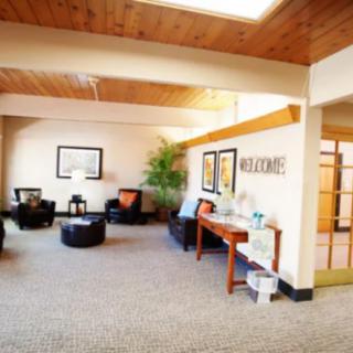 A modern waiting area with comfortable seating and welcoming decor.