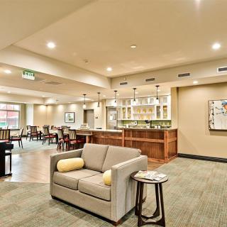 A modern lounge with comfortable seating and stylish decor.