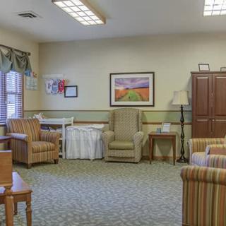 A cozy living room with comfortable seating and warm decor.
