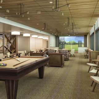 A stylish recreation room featuring a pool table with modern decor.