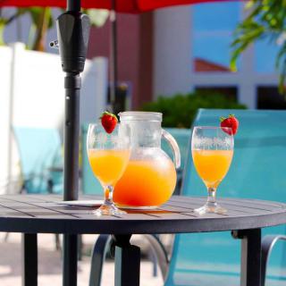 Refreshing drinks by the poolside on a sunny day.