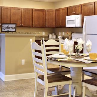 A cozy and inviting kitchen and dining area with a modern aesthetic.