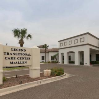 Exterior view of a healthcare facility with a sign reading 'Transitional Care Center McAllen'.