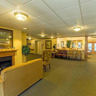 A cozy lobby area with comfortable seating and warm lighting.
