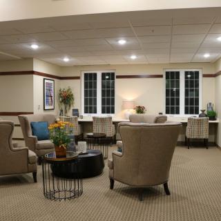 A cozy lounge area with comfortable seating and elegant decor.