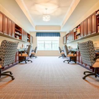 A modern and well-organized open office space with multiple workstations.