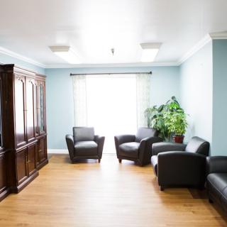 A modern living room with comfortable seating and natural light.