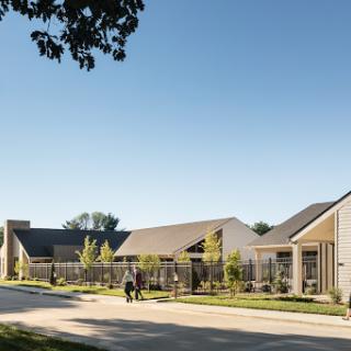 A modern residential community featuring contemporary architecture and landscaped outdoor spaces.