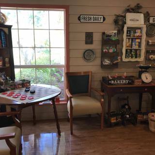 A cozy vintage interior with antique furniture and decor.