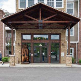 Main entrance to a residential building with wooden features.