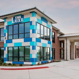 A modern commercial building with a colorful exterior.