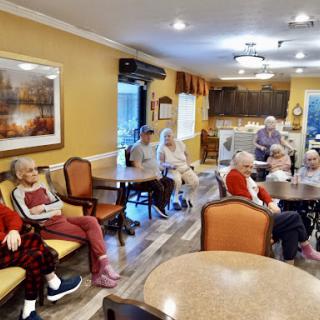 Residents enjoying time together in a communal lounge.