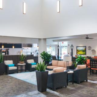 A modern lobby featuring comfortable seating and vibrant decor.