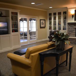 A cozy living room with comfortable seating and stylish decor.