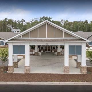 A front view of a large pavilion-style building entrance.