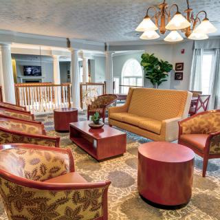 A cozy living room with comfortable seating and stylish decor.