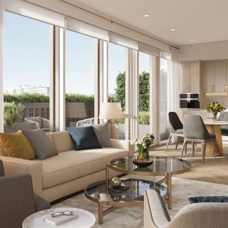 A modern living room with large windows, featuring neutral tones and stylish furniture.