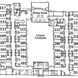 Floor plan of a building featuring a central courtyard and labeled rooms.