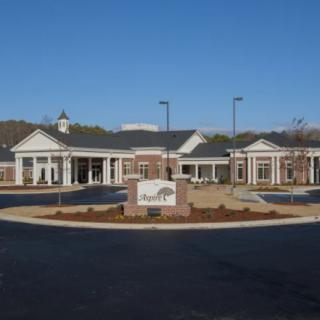 A healthcare facility with a welcoming entrance and clear signage.