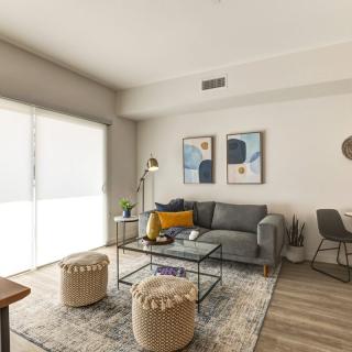 A modern living room with stylish furniture and decor.