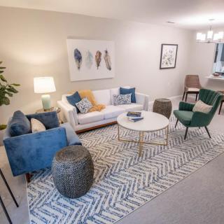 A modern living room with stylish furniture and decor.