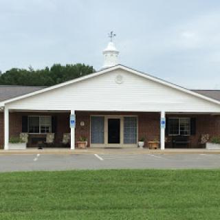 A peaceful community building featuring a traditional architectural style.