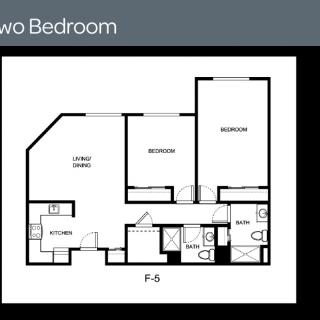 A blueprint of a two-bedroom apartment layout with labeled rooms.