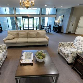 A modern lobby with comfortable seating and stylish decor.
