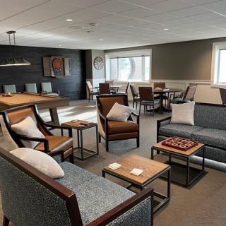 A modern lounge area with comfortable seating and stylish decor.
