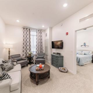 A modern living room with stylish furniture and a cozy atmosphere.