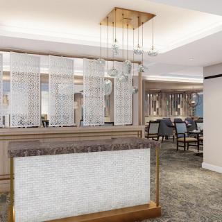 A modern reception area with elegant design elements and comfortable seating.