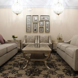 A cozy living room with elegant furniture and decor.