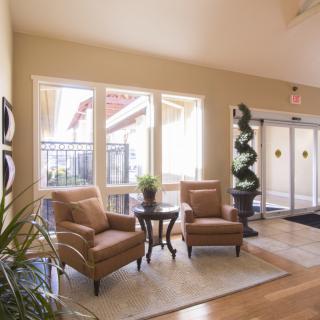 Bright and welcoming lobby area with comfortable seating and natural light.