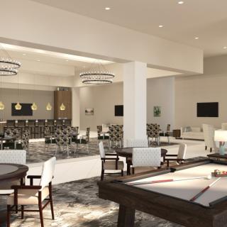 A modern luxury lounge with a bar, seating area, and pool table.