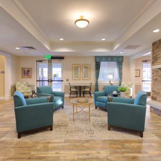 A modern and cozy living room with comfortable seating and stylish decor.