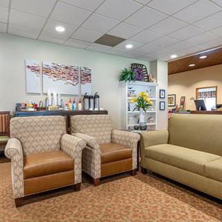 A cozy waiting area with comfortable seating and inviting dcor.