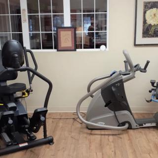 A home gym setup featuring exercise machines.