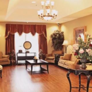 A luxurious living room with elegant furnishings and decor.